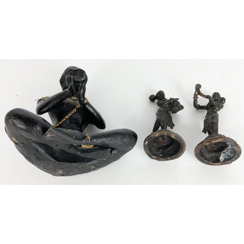 310 - PAIR OF METAL FIGURES AND ONE OTHER DEPICTING A SEATED FIGURE