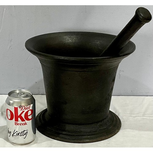 322 - LARGE IRON PESTLE AND MORTAR