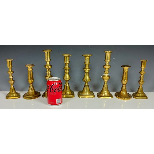 337 - QUANTITY OF BRASS CANDLESTICKS