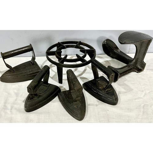 340 - 4 FLAT IRONS WITH IRON TRIVET AND COBBLERS IRON SHOE LAST