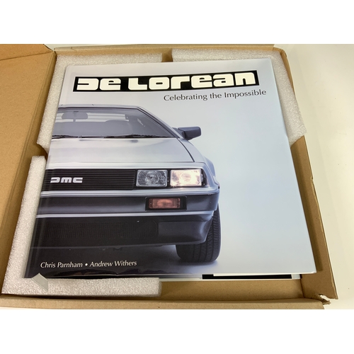 34 - MOTOR CAR BOOK DE LOREAN, CELEBRATING THE IMPOSSIBLE, BY CHRIS PARNHAM ANDREW WITHERS, IN ORIGINAL D... 