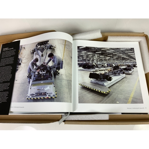 34 - MOTOR CAR BOOK DE LOREAN, CELEBRATING THE IMPOSSIBLE, BY CHRIS PARNHAM ANDREW WITHERS, IN ORIGINAL D... 