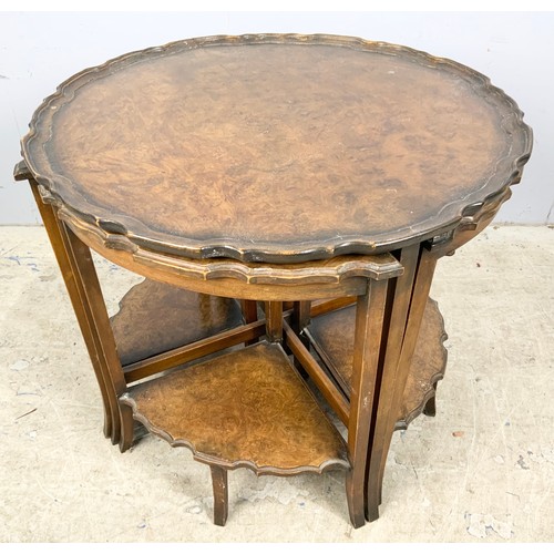 602 - NEST OF MAHOGANY OCCASIONAL TABLES WITH PIE CRUST TOP 61cm DIAMETER