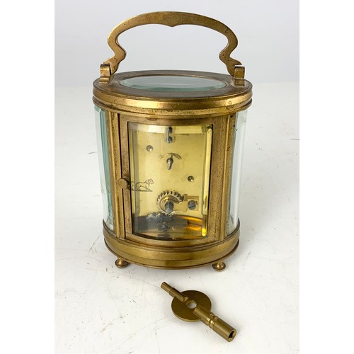 259 - OVAL CASED CARRIAGE CLOCK