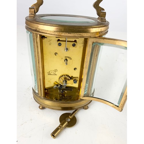 259 - OVAL CASED CARRIAGE CLOCK