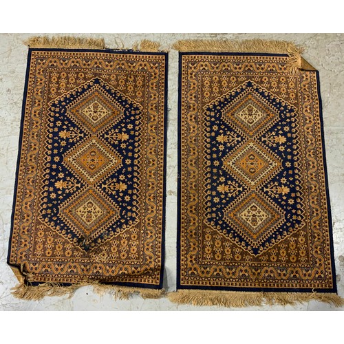 737 - PAIR OF BLUE GROUND RUGS 112cm x 69cm & A RED GROUND RUG 119cm x 83cm