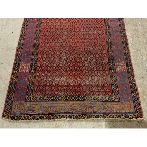 739 - RED GROUND RUG 145cm x 105cm