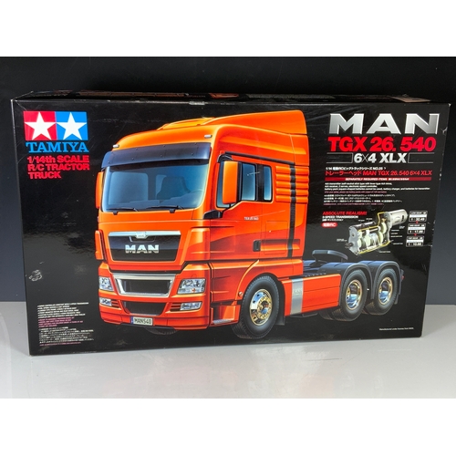 191 - TAMIYA BOXED 1:14TH SCALE RC TRACTOR TRUCK, MAN TGX 26, KIT REF 56325, NOTE 3 TUBS WITH (ADDITIONAL?... 