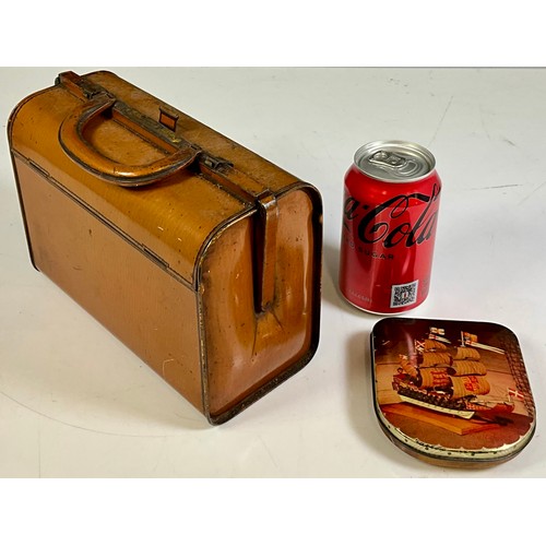 393 - NOVELTY HUNTLEY & PALMERS GLADSTONE BAG BISCUIT TIN T/W A TOFFEE TIN WITH SHIP DECORATION ‘EDWARD SH... 