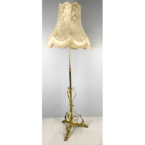 300 - BRASS ADJUSTABLE STANDARD LAMP ON TRIPOD BASE WITH CLAW FEET