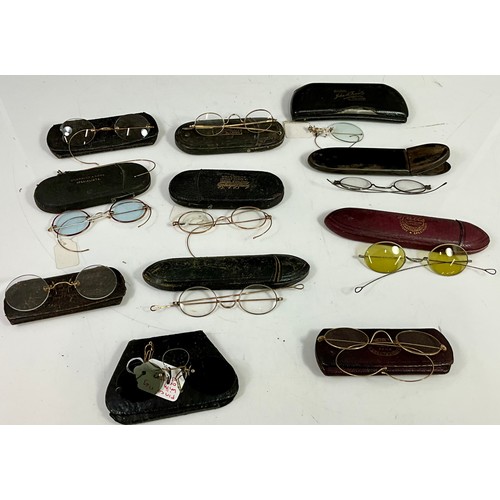 410 - COLLECTION OF VINTAGE SPECTACLES/EYE GLASSES IN CASES