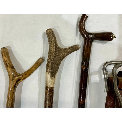 418 - SHOOTING STICK, AND THREE WALKING CANES OR ROD REST, ONE WITH HORN HANDLE