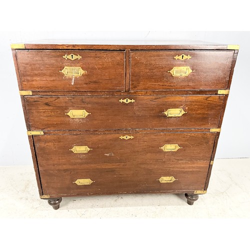 687 - MILITARY CHEST OF DRAWERS OF 2 OVER 2 DRAWERS BOTTOM DRAW ER DOUBLE SIZE ON TURNED FEET WITH CARRY H... 