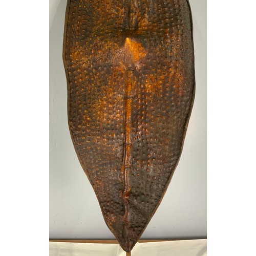 76 - TRADITIONAL TRIBAL SHIELD OF STRETCHED ANIMAL HIDE ON CENTRAL STAFF, POSSIBLY A DINKA / NUER  FROM S... 