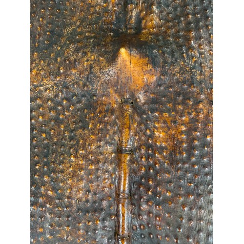 76 - TRADITIONAL TRIBAL SHIELD OF STRETCHED ANIMAL HIDE ON CENTRAL STAFF, POSSIBLY A DINKA / NUER  FROM S... 
