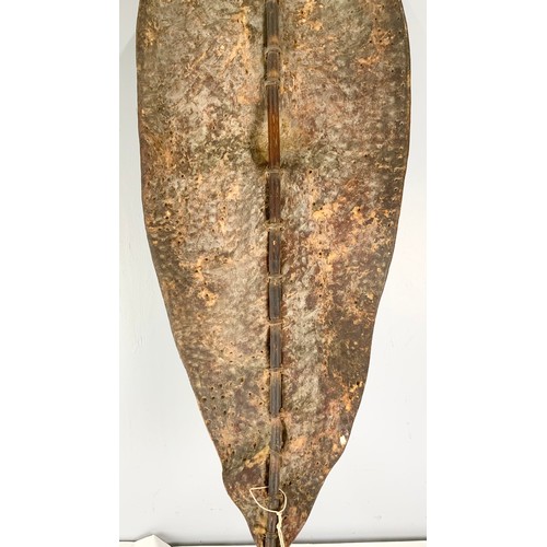 76 - TRADITIONAL TRIBAL SHIELD OF STRETCHED ANIMAL HIDE ON CENTRAL STAFF, POSSIBLY A DINKA / NUER  FROM S... 