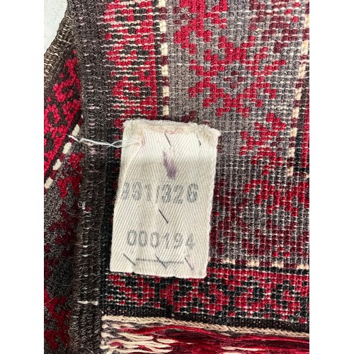 753 - 2 RED GROUND RUGSWITH EASTERN DESIGN LARGEST 134cm x 87cm