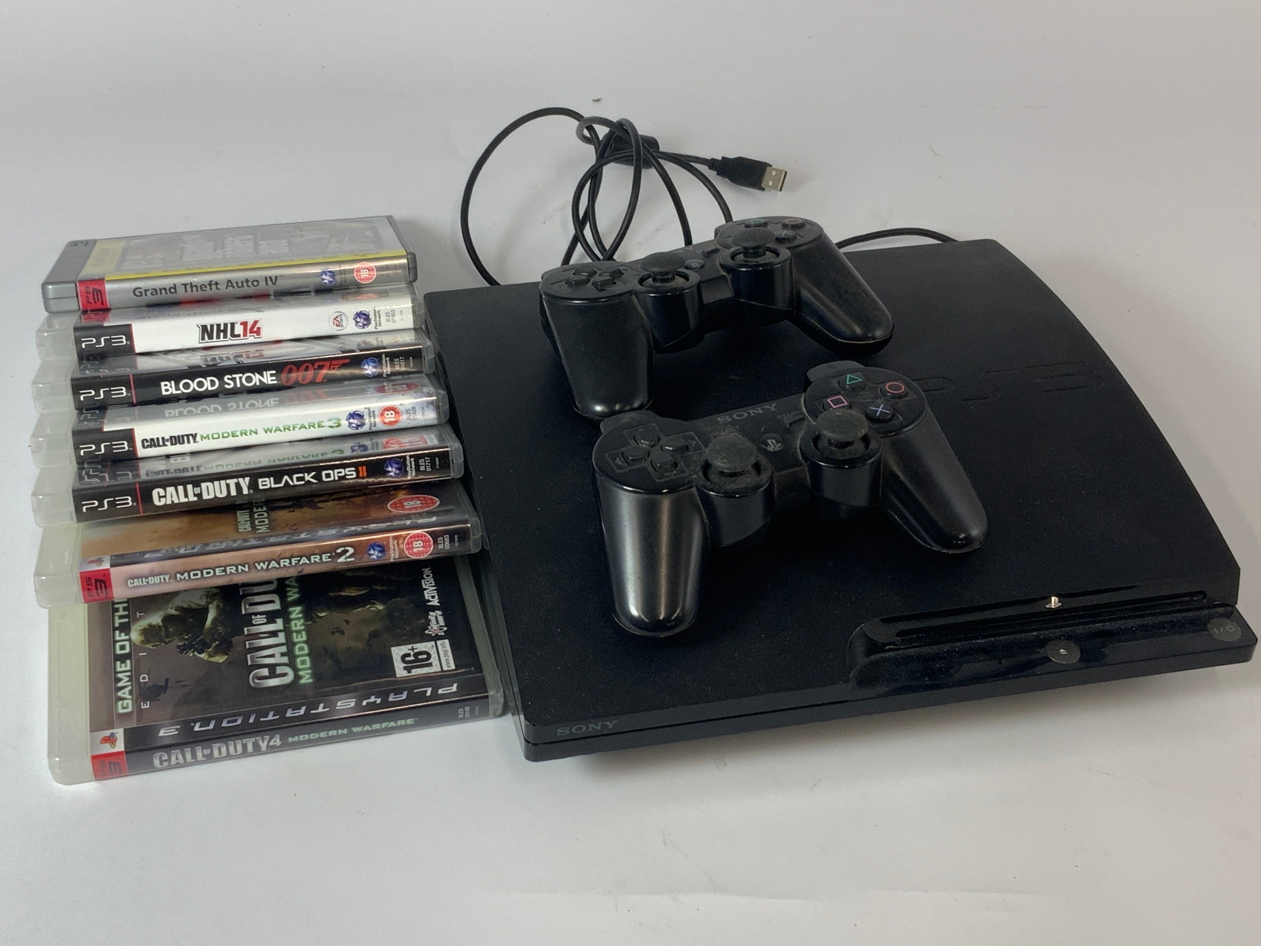 SONY PS 3 PLAY STATION, PLUS 2 DUAL SHOCK 3 CONTROLLERS, & 7 GAMES ...