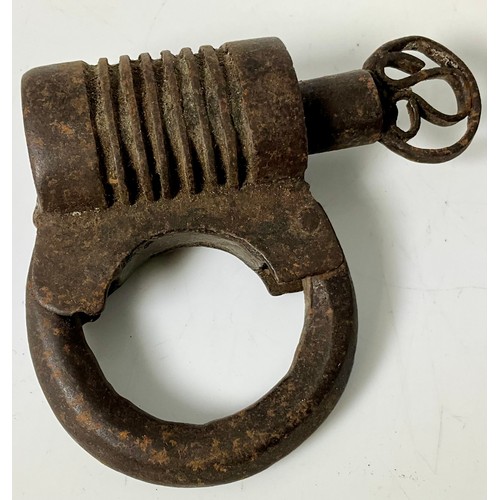 PAIR OF VICTORIAN HIATT WARRANTED WROUGHT IRON HANDCUFFS, AN EARLY ...