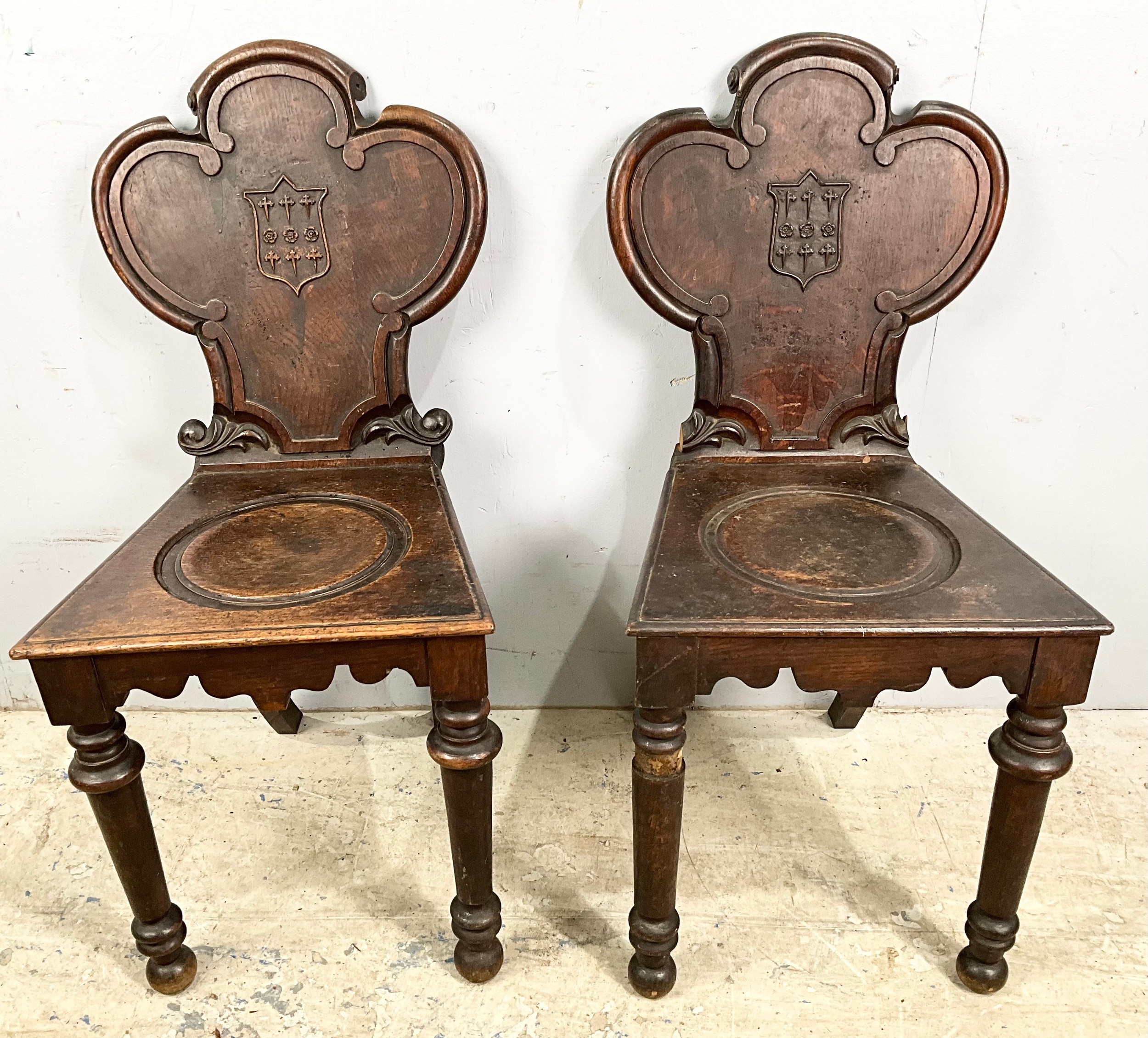 PAIR OF VICTORIAN HALL CHAIRS WITH CARVED CREST BACKS