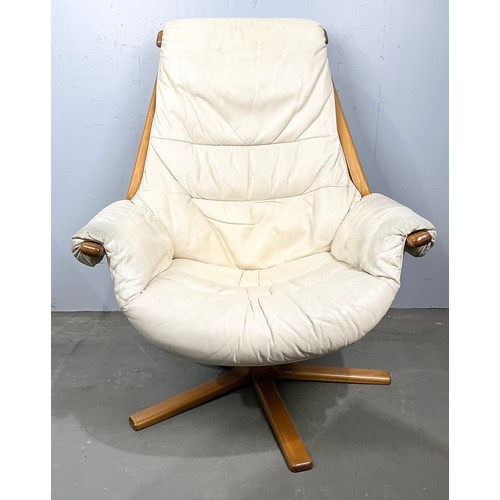 704 - TRADE ONLY- SWEDISH CREAM LEATHER SWIVEL RECLINING ARMCHAIR, BELIEVED TO BE BY GOTE MOBLER (OPTION)