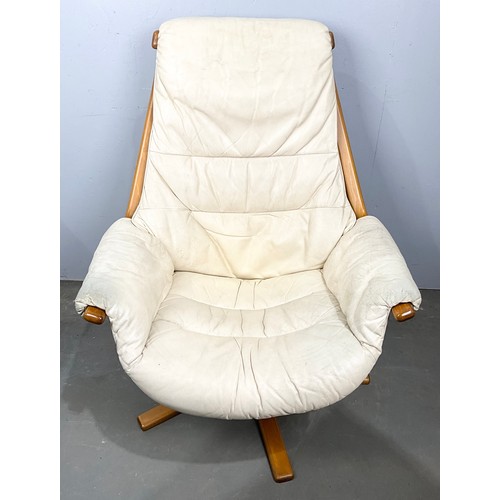 704 - TRADE ONLY- SWEDISH CREAM LEATHER SWIVEL RECLINING ARMCHAIR, BELIEVED TO BE BY GOTE MOBLER (OPTION)