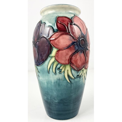 193 - MOORCROFT POTTERY BALUSTER VASE DECORATED IN THE ANEMONE PATTERN WITH IMPRESSED AND SIGNATURE 18.5cm