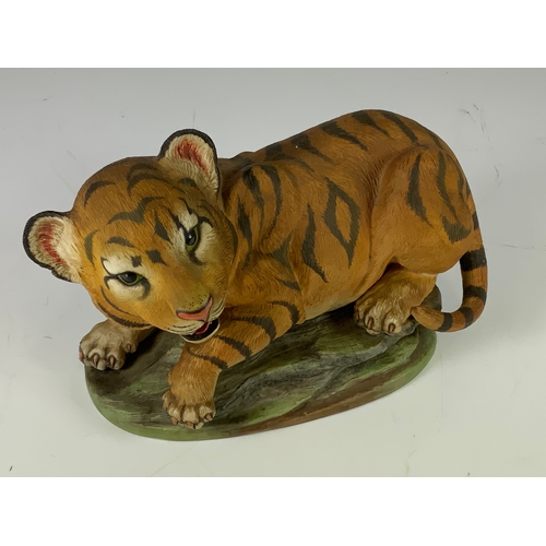 102 - A BOEHM BENGAL TIGER CUB, 200-21