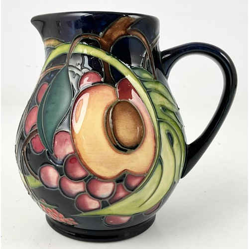 196 - MOORCROFT POTTERY EMMA BOSSONS QUEENS CHOICE PATTERN JUG WITH IMPRESSED BACKSTAMP 12cm