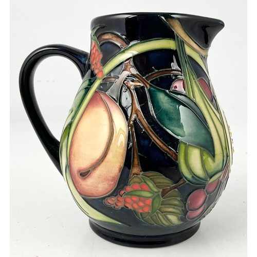 196 - MOORCROFT POTTERY EMMA BOSSONS QUEENS CHOICE PATTERN JUG WITH IMPRESSED BACKSTAMP 12cm
