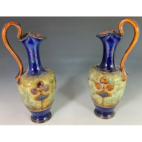 211 - PAIR OF ROYAL DOULTON LAMBETH ART NOUVEAU STONEWARE EWERS