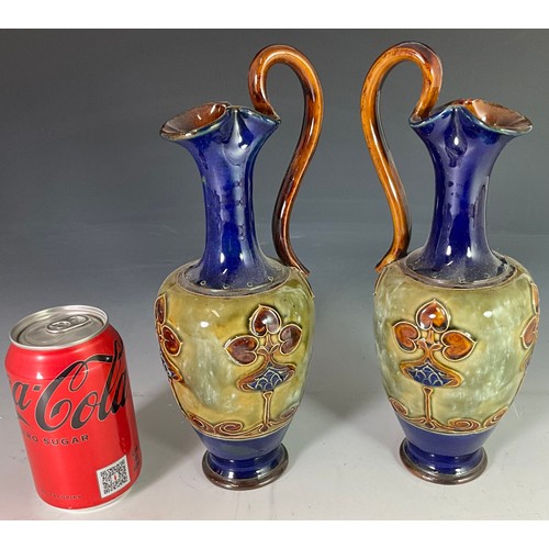 211 - PAIR OF ROYAL DOULTON LAMBETH ART NOUVEAU STONEWARE EWERS