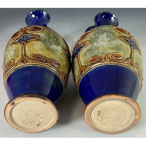 211 - PAIR OF ROYAL DOULTON LAMBETH ART NOUVEAU STONEWARE EWERS
