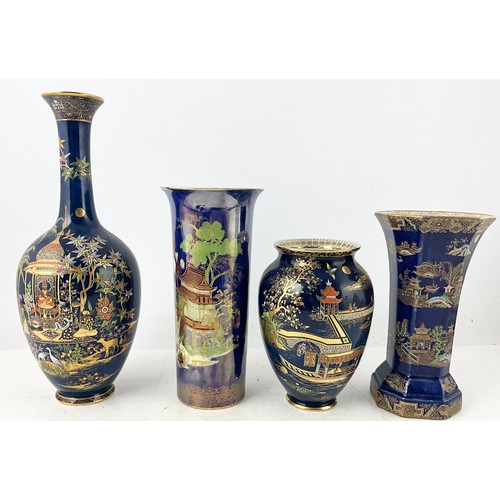 FOUR VINTAGE CARLTON WARE VASES ON BLUE GROUND INCLUDING KANG SI , PERSIAN , BARGE MIKADO PATTERNS TALLEST 36cm