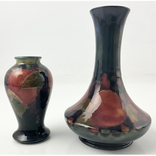 14 - TWO MOORCROFT POTTERY VASES DECORATED IN THE POMEGRANATE PATTERN BOTH WITH SIGNATURE MARKS TO BASE T... 