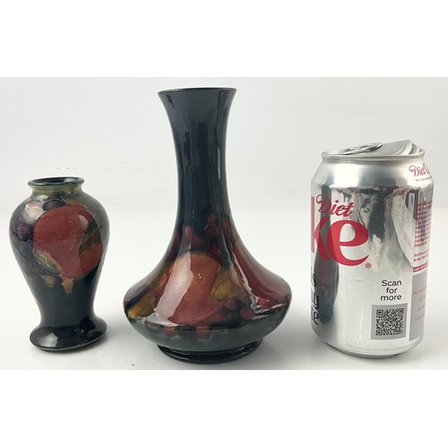 14 - TWO MOORCROFT POTTERY VASES DECORATED IN THE POMEGRANATE PATTERN BOTH WITH SIGNATURE MARKS TO BASE T... 