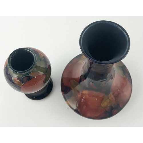 14 - TWO MOORCROFT POTTERY VASES DECORATED IN THE POMEGRANATE PATTERN BOTH WITH SIGNATURE MARKS TO BASE T... 