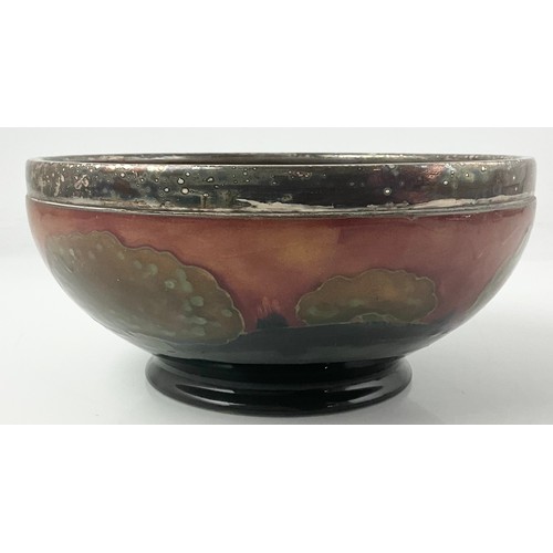 21 - RARE MOORCROFT POTTERY FOOTED BOWL DECORATED IN THE EVENTIDE LANDSCAPE PATTERN WITH A SILVER PLATED ... 