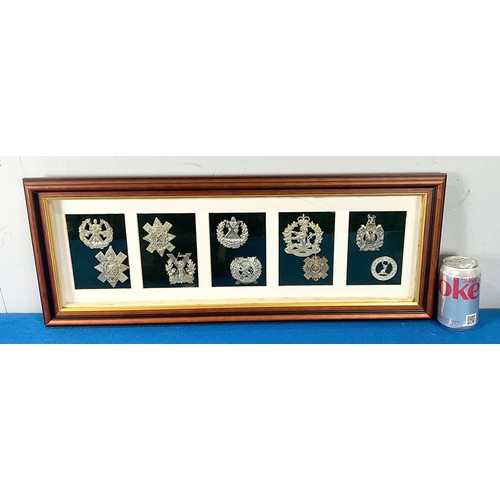 43 - COLLECTION OF MILITARY CAP BADGES, FRAMED FOR DISPLAY