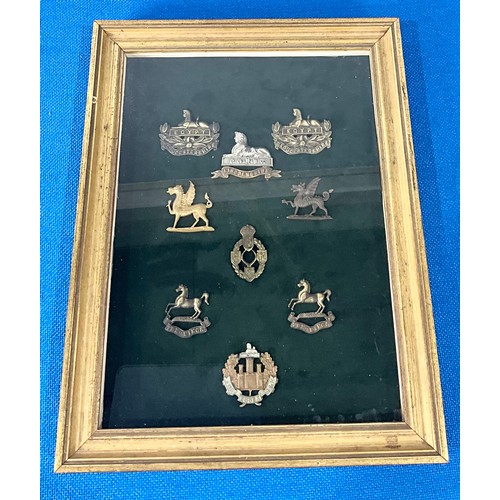 43 - COLLECTION OF MILITARY CAP BADGES, FRAMED FOR DISPLAY