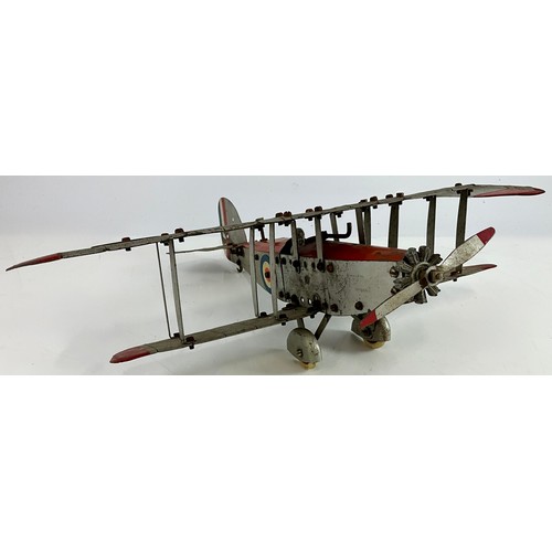  MECCANO - A BUILT TINPLATE MECCANO AEROPLANE MODEL OF A BIPLANE APPROX 36 CM LONG AND 46CM WINGSPAN