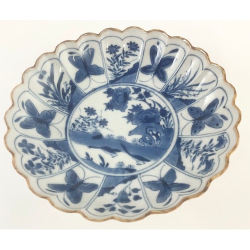 ORIENTAL PORCELAIN A CHINESE LOBED / SCALLOPED BLUE AND WHITE DISH / BOWL DECORATED  WITH BIRD, INSECTS AND FLOWERS POSSIBLY KANGXI PERIOD  17cm DIAMETER