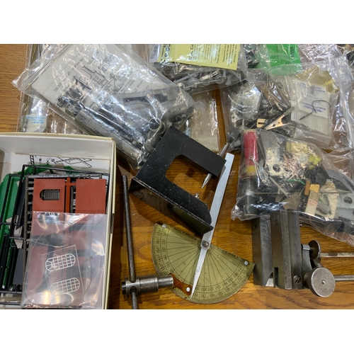LARGE BOX OF SPARES, SEVERAL BAGS OF MOTORS, CHASSIS, SPRINGS SPARES ...