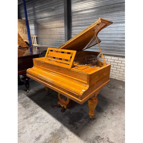 205 - Collard and Collard (c1900)
A 204cm grand piano in a figured satinwood case. This instrument has bee... 