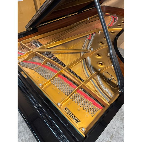 209 - Steinway (c1982)
A 275cm Model D concert grand piano in a bright ebonised case on square tapered leg... 