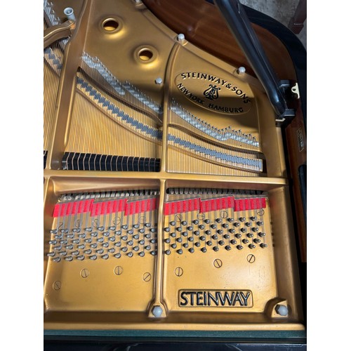 209 - Steinway (c1982)
A 275cm Model D concert grand piano in a bright ebonised case on square tapered leg... 