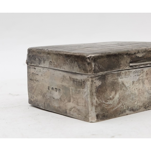 27 - A Victorian silver cigarette boxby William Neale Ltd., Birmingham 1852, of rectangular form, the lid... 
