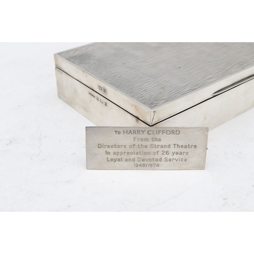 29 - An Elizabeth II silver cigarette box,by Harman Brothers, Birmingham 1972, the interior with engine-t... 
