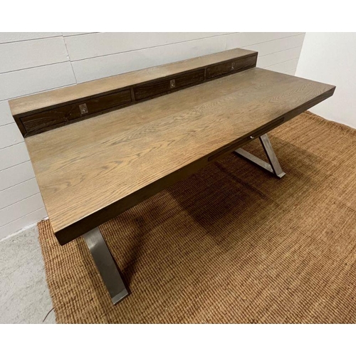 104 - A light beech chrome desk with cross chrome legs and three drawers (H88cm W160cm D80cm)