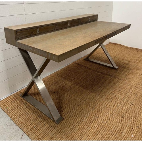 104 - A light beech chrome desk with cross chrome legs and three drawers (H88cm W160cm D80cm)